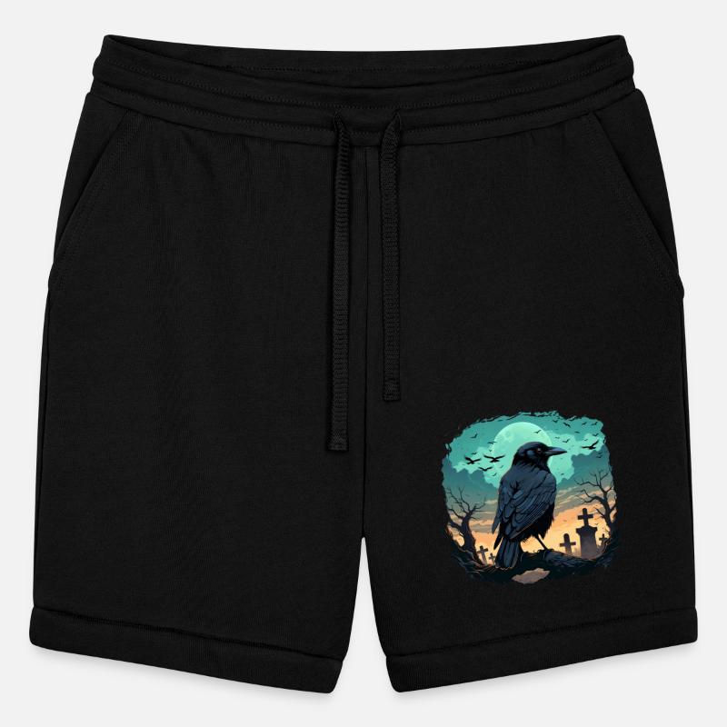 A black raven in a gloomy cemetery